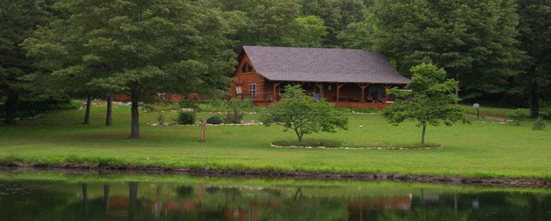 cabin by pond